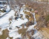 aerial facing north (note access to 3-car garage/barn)