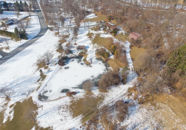 aerial facing north (note access to 3-car garage/barn)