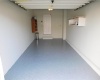 Built-In Garage with an Opener & Epoxy Floor