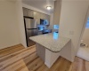 Kitchen with Granite Countertops, Breakfast Bar