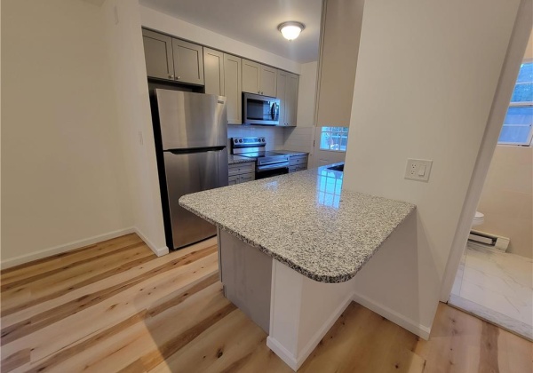 Kitchen with Granite Countertops, Breakfast Bar